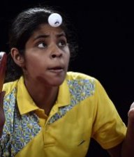 GImme a break: Erandi Warusawithana of Sri Lanka looks like she's explaining why she shouldn't have to tidy her room while playing against Malaysia's Ng Sock Khim